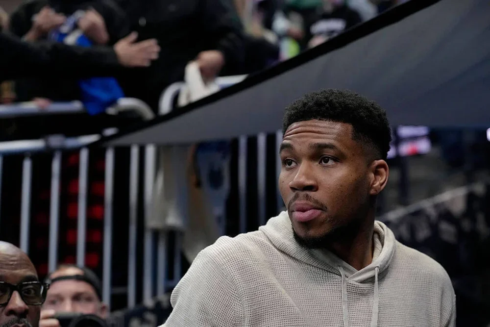 Giannis Antetokounmpo looks on after a Bucks game.